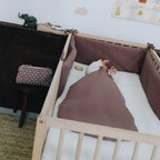 Chestnut bumper for a baby's room