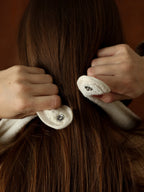 attache tablier de bain