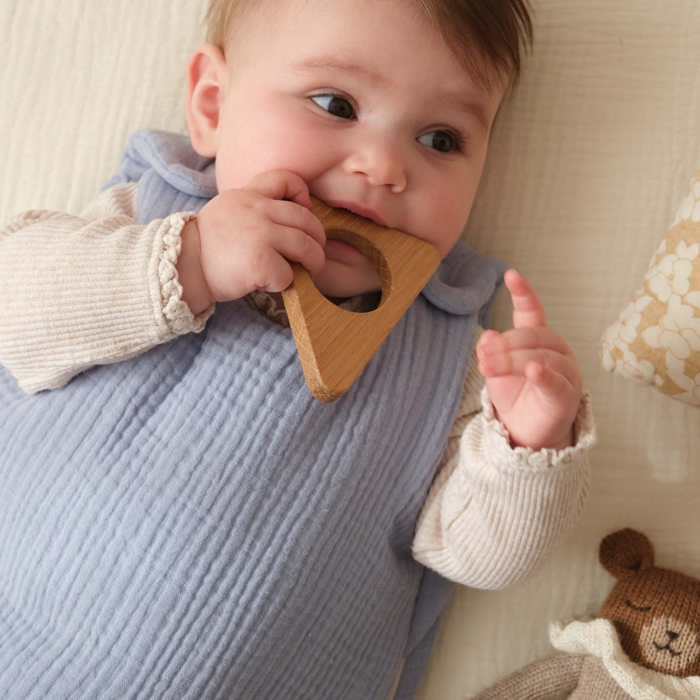 Baby with blue sleeping bag