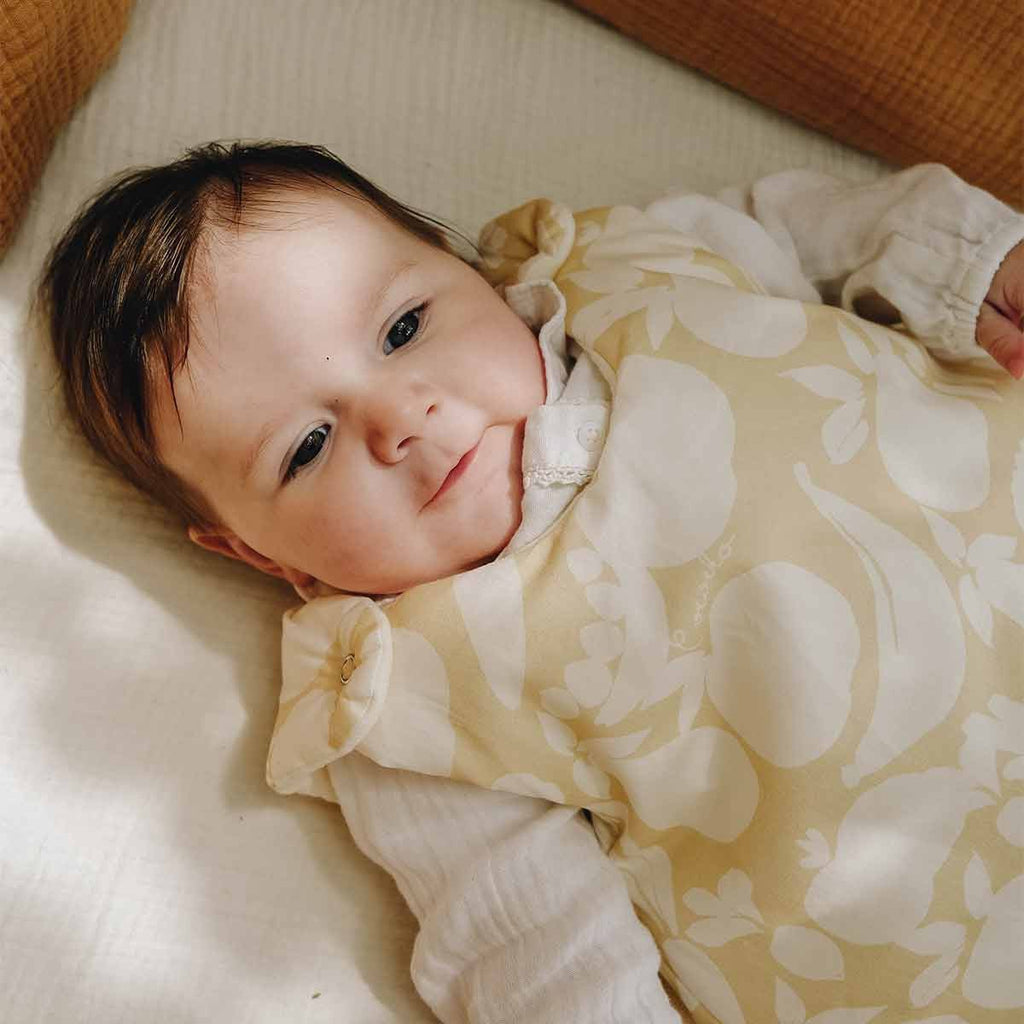 Baby in a GOTS cotton sleeping bag