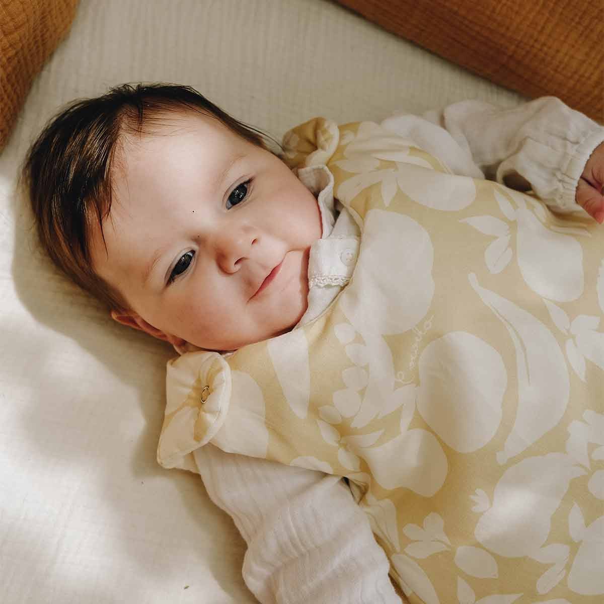 Baby in a GOTS cotton sleeping bag