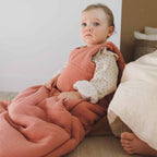 Baby with marsala sleeping bag