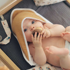 Camel bath cape with baby