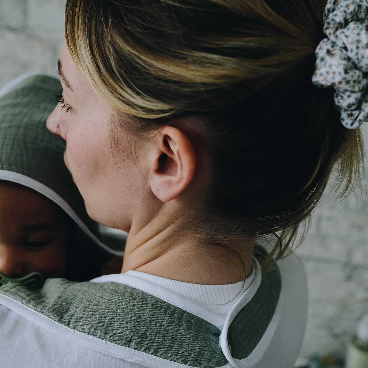 Sage green apron bath cape close-up