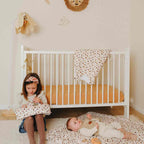 Leopard cotton baby comforter in a bedroom