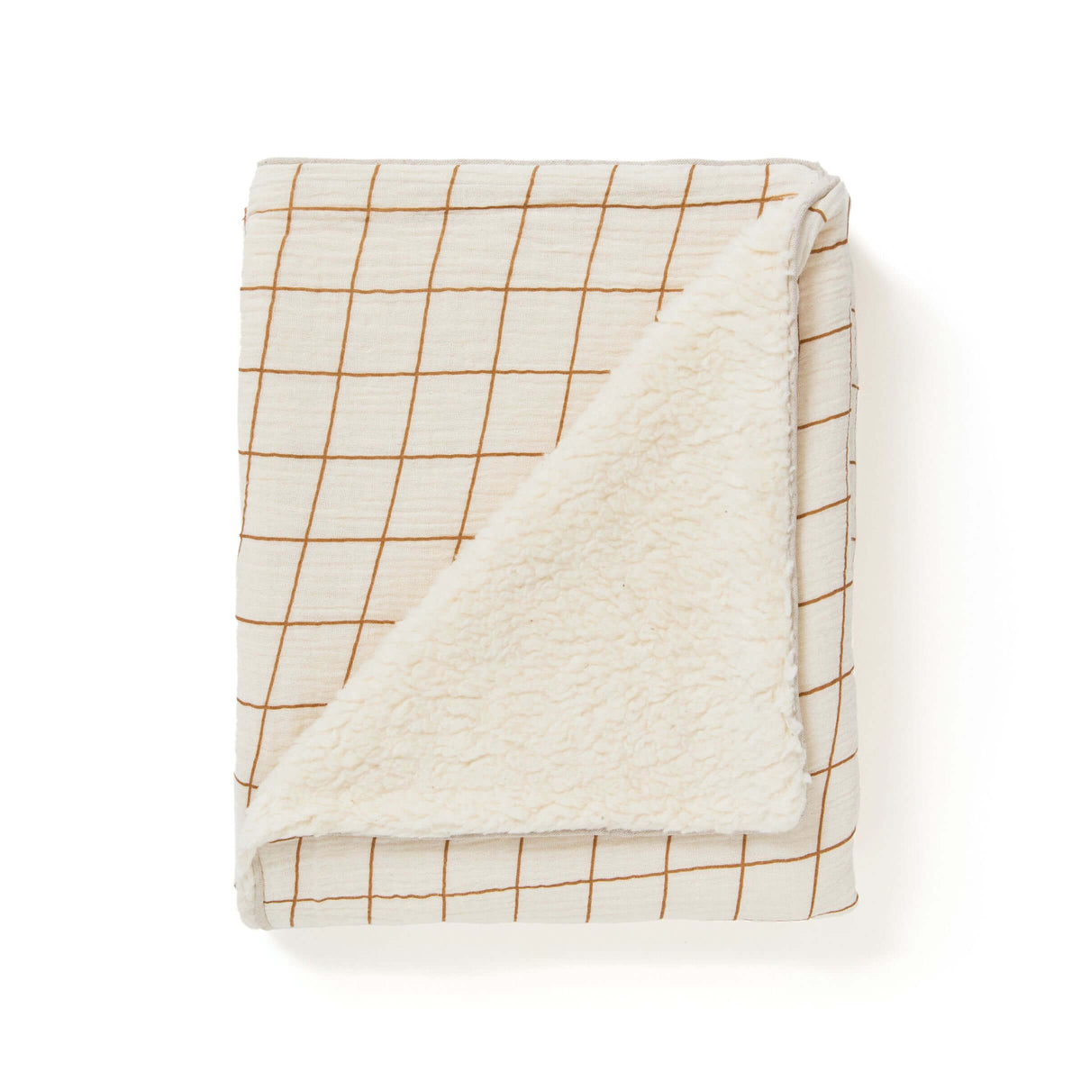 Couverture bébé écrue à carreaux camel pliée, face polaire sherpa