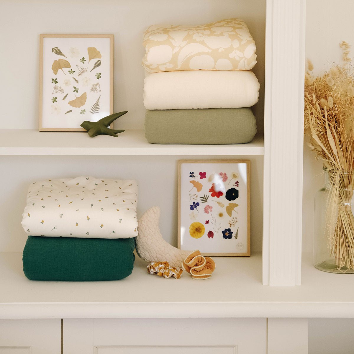 Fleece blankets in different colors folded on a shelf