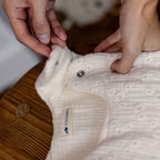 Shoulder strap of a sleeping bag with English embroidery