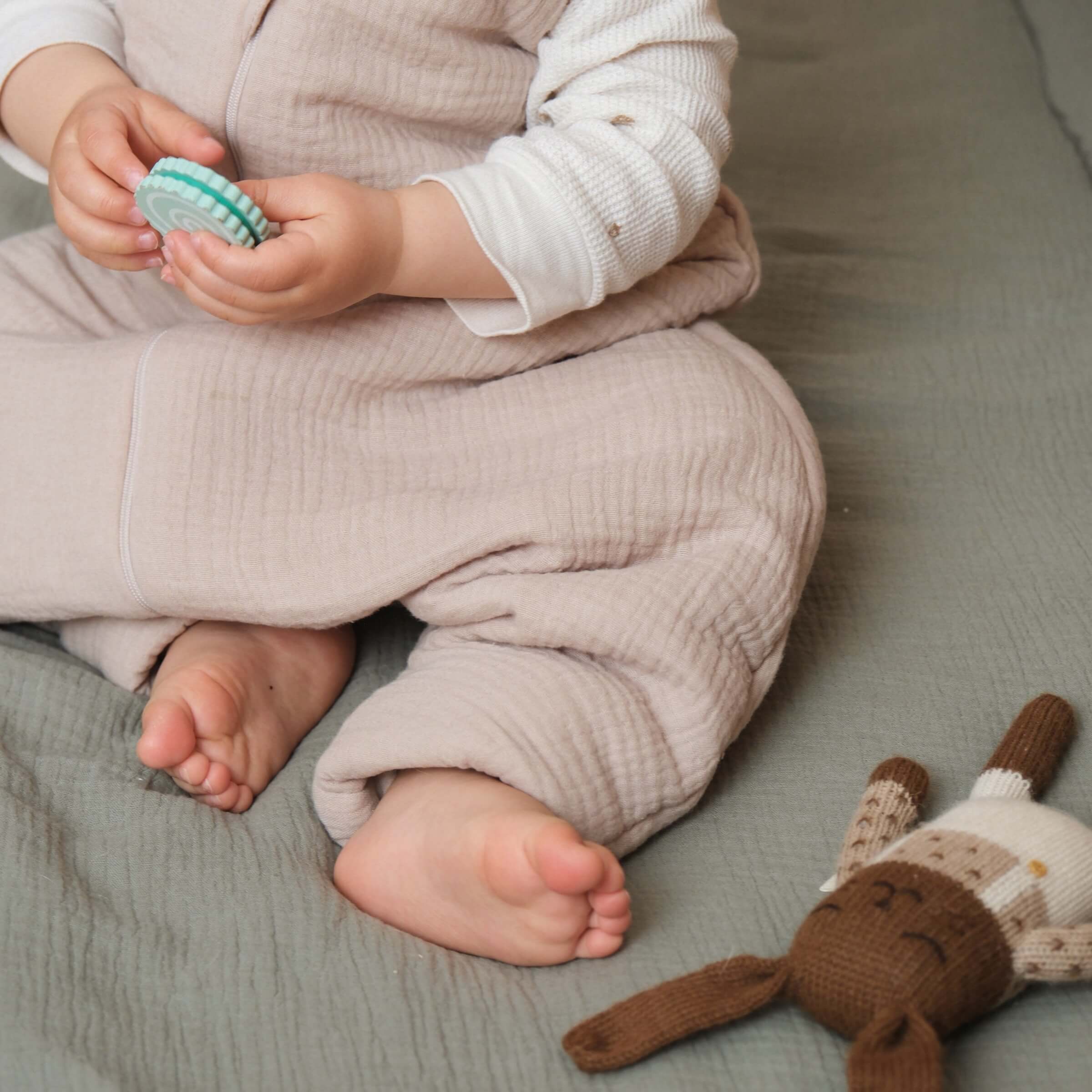 Beige sleeping bag with legs