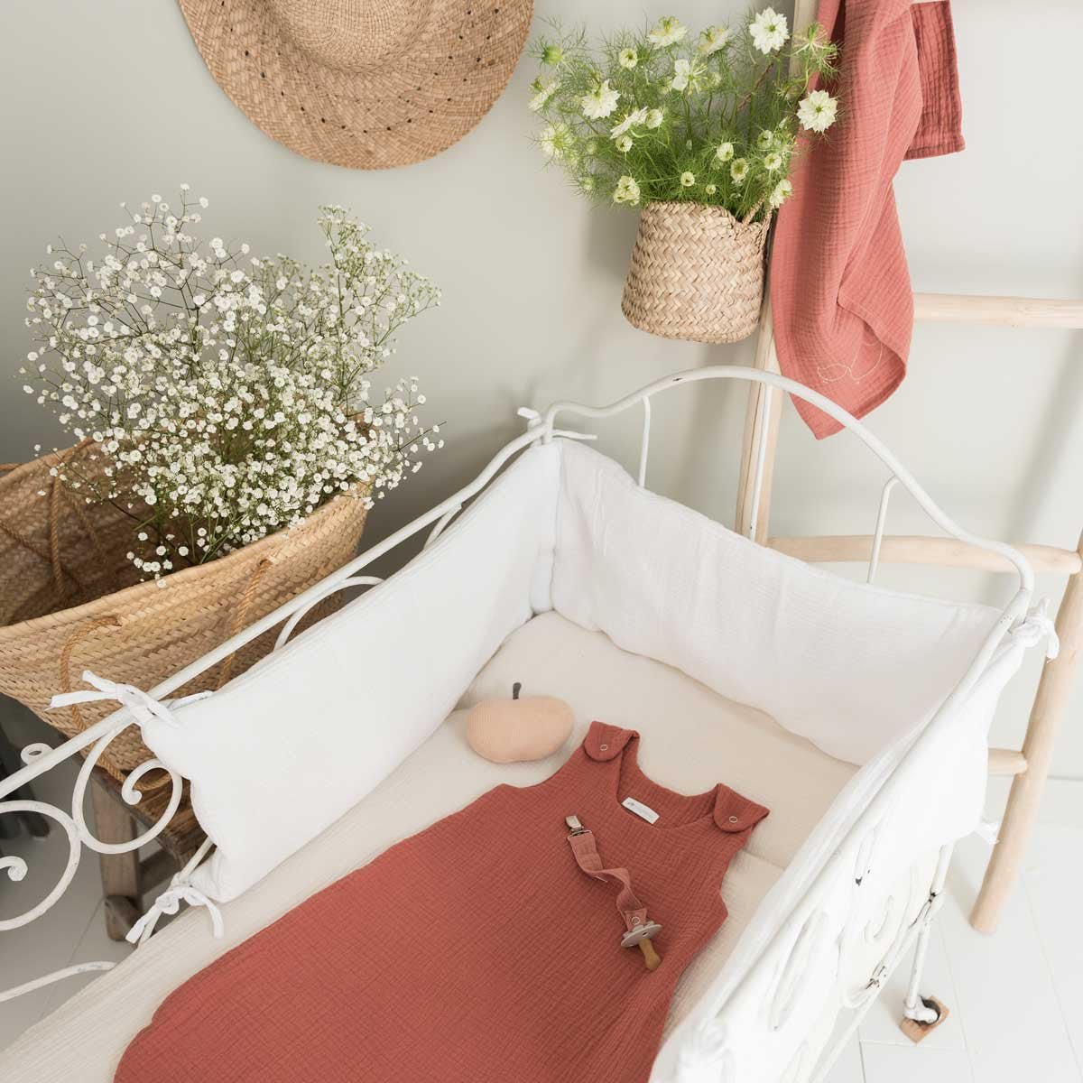 Sleep sack tog 1 in marsala in a cot