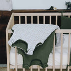 Baby sleeping bags in a nursery