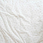 Close-up of children's comforter cover in plein air organic cotton