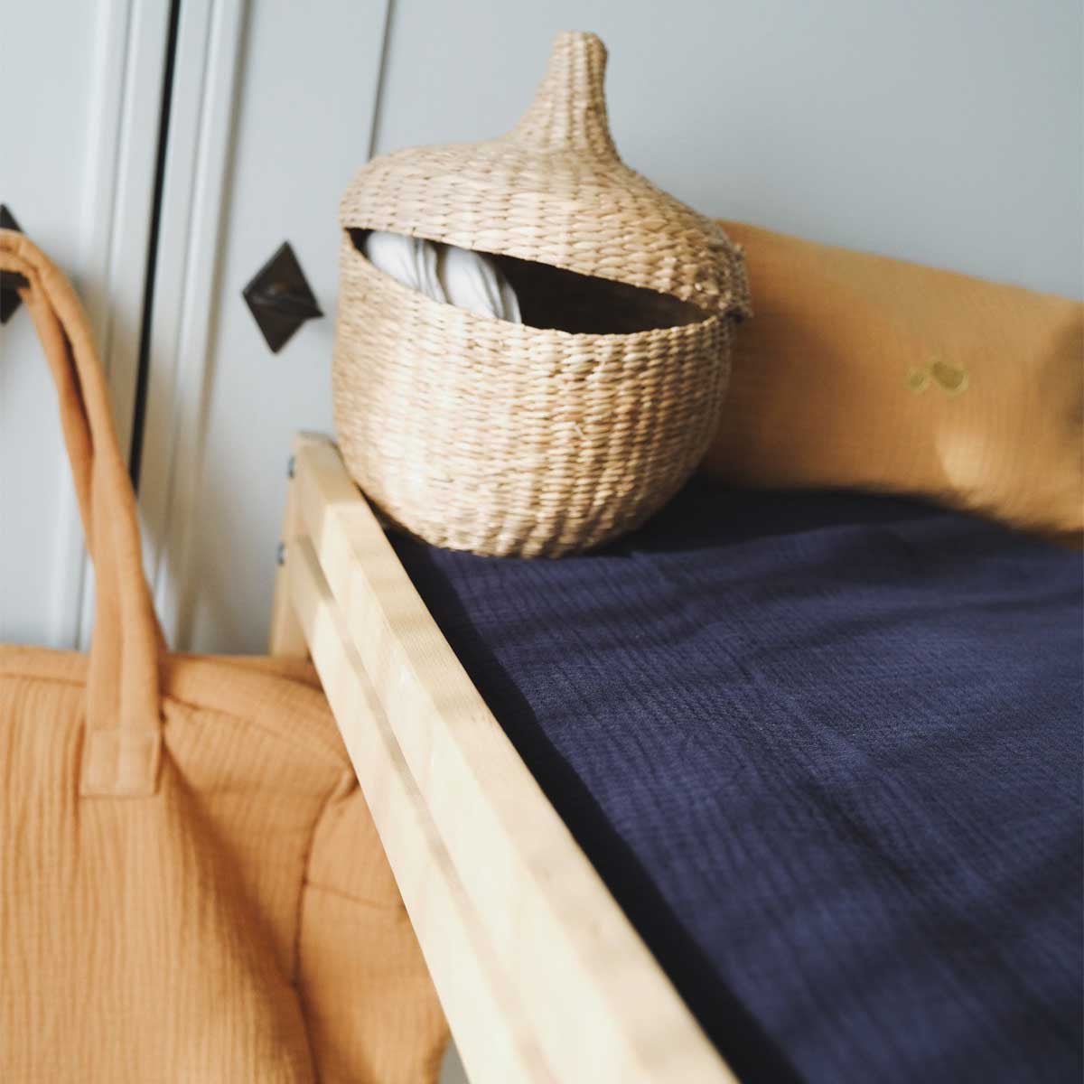 Midnight blue cotton gauze changing mat cover, close-up view