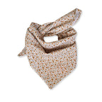 Baby diaper in cotton gauze with floral pattern