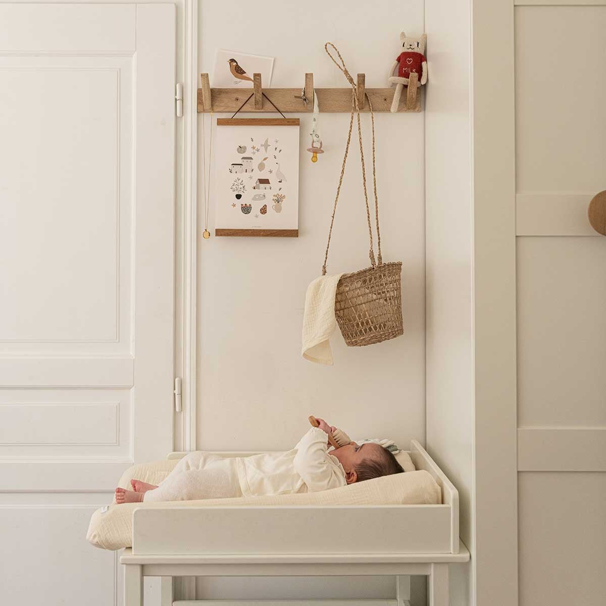 Changing mat with ecru cotton gauze cover