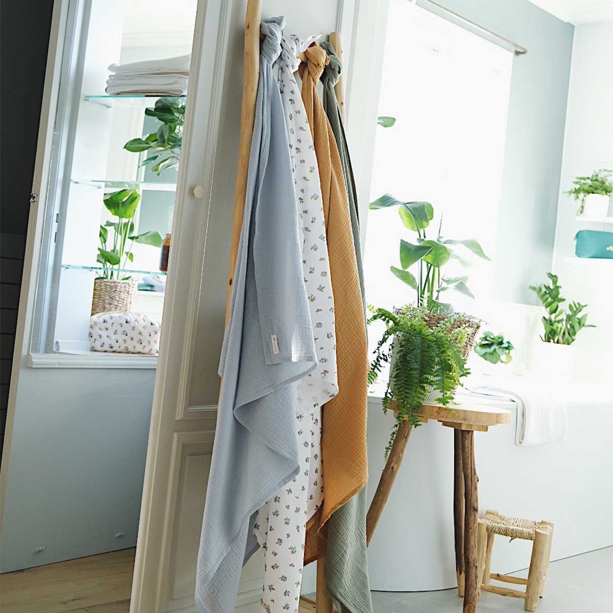 Maxis diapers suspended from a ladder