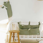 Sage green comforter holder for a baby's room