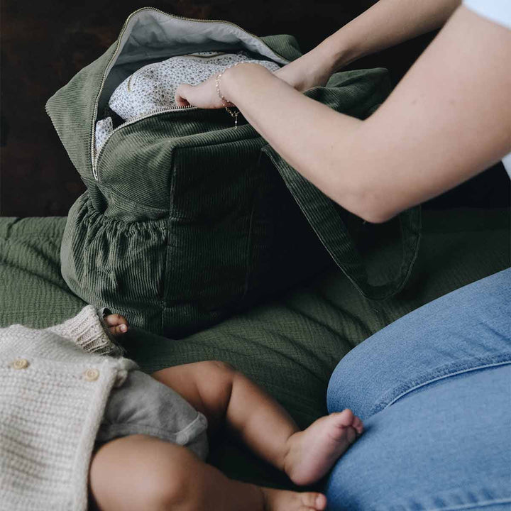 Sac à lange en velours avec bébé