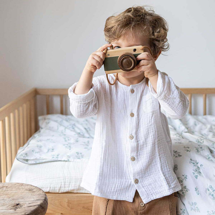 Taie d'oreiller en coton bio figuier dans une chambre d'enfant