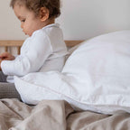 White washed cotton pillowcase, close-up view